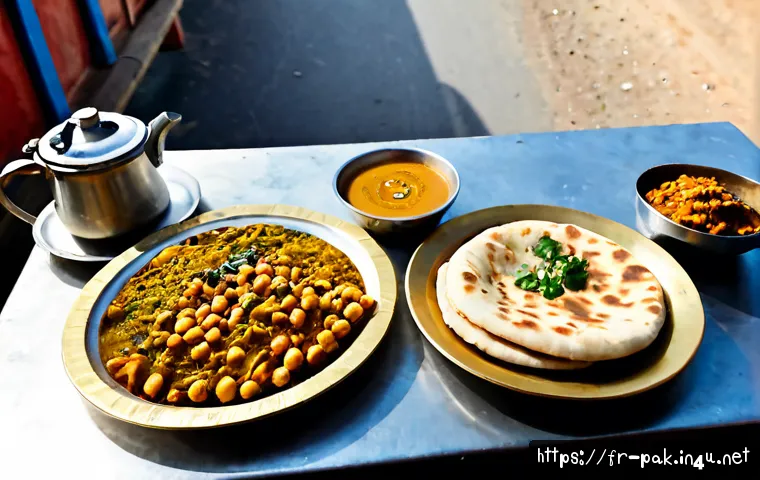 Home 17 파키스탄 소도시 별미 음식 - Photorealistic Pakistani small-town breakfast specialty, freshly baked naan bread, spiced chickpea c...